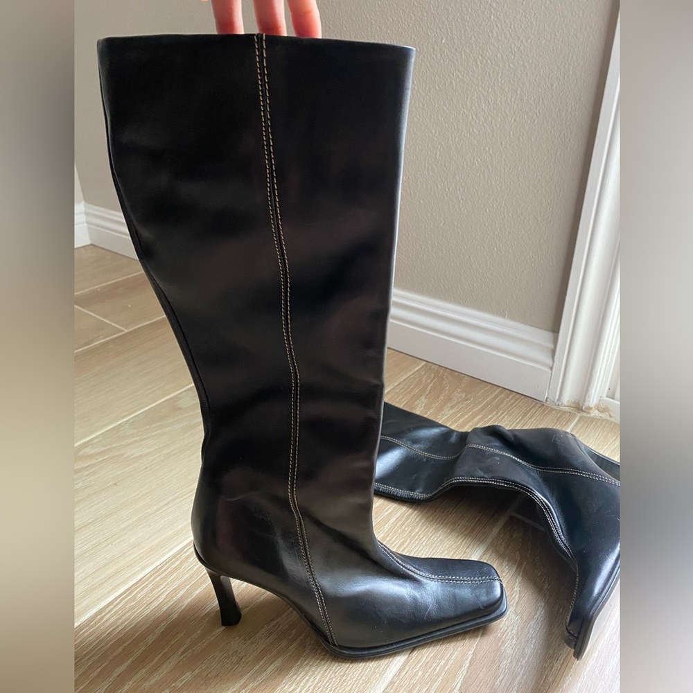 Black Tall Knee High Leather Boots with White Stitching.